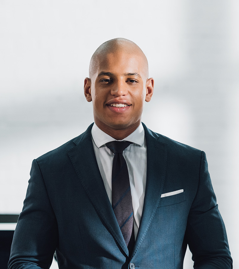 young african american businessman holding digital FYREY7J